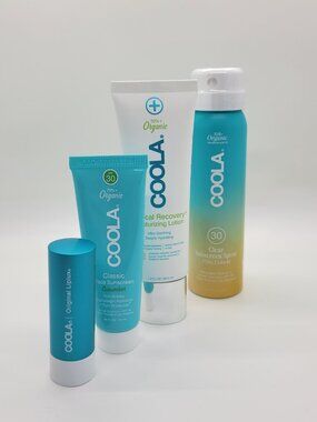 New COOLA Organic Suncare Travel Set 4 Pc Sunscreen Lip Balm Bag NWT Exp 10/2025